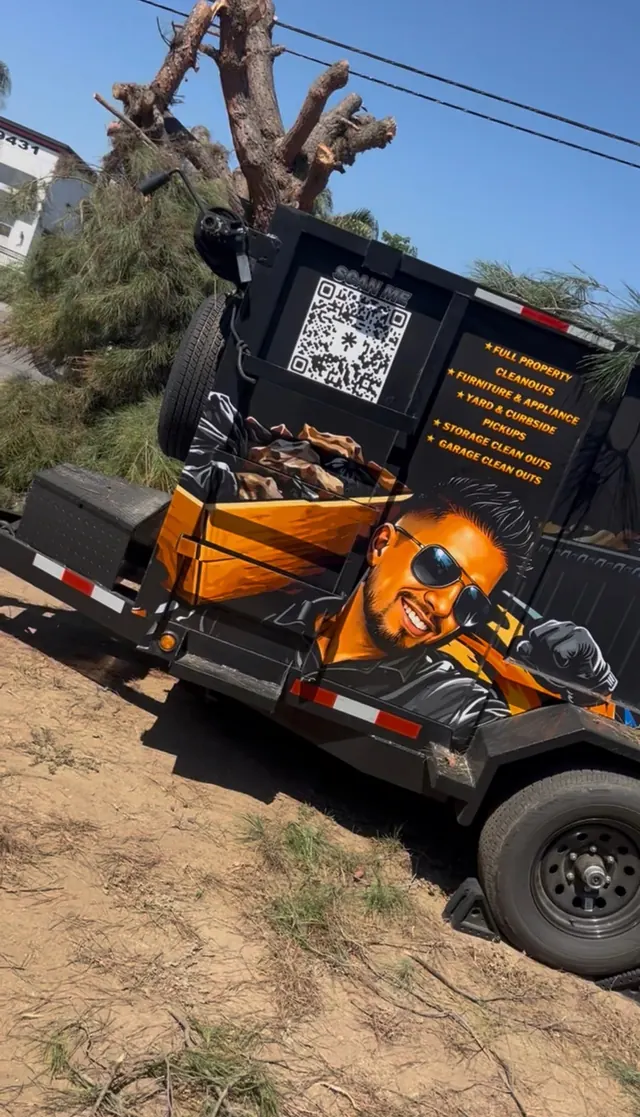 Close-up of the Pro Lift trailer wrap with QR code and cartoon mascot